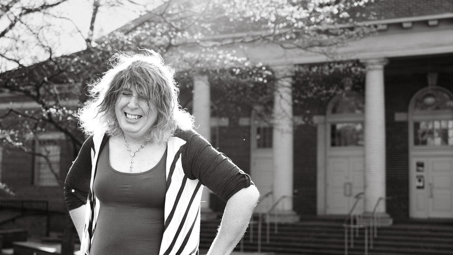 Portrait of Luna Vanaman in front of Leazar Hall at NC State.