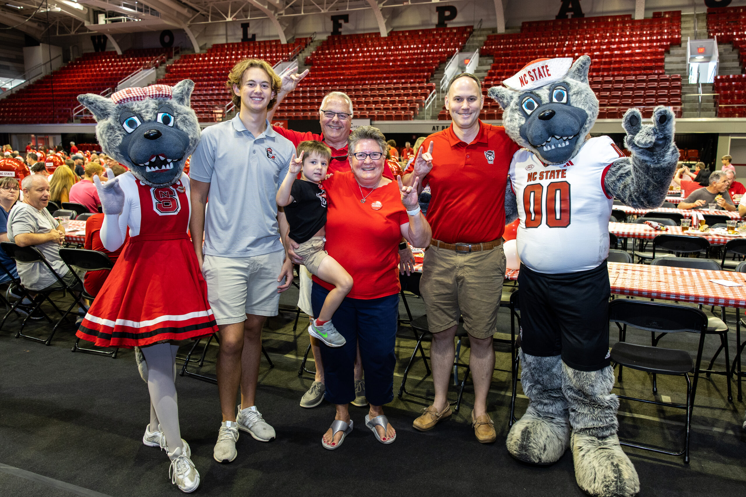 Family with NC&#160;State Gear on.