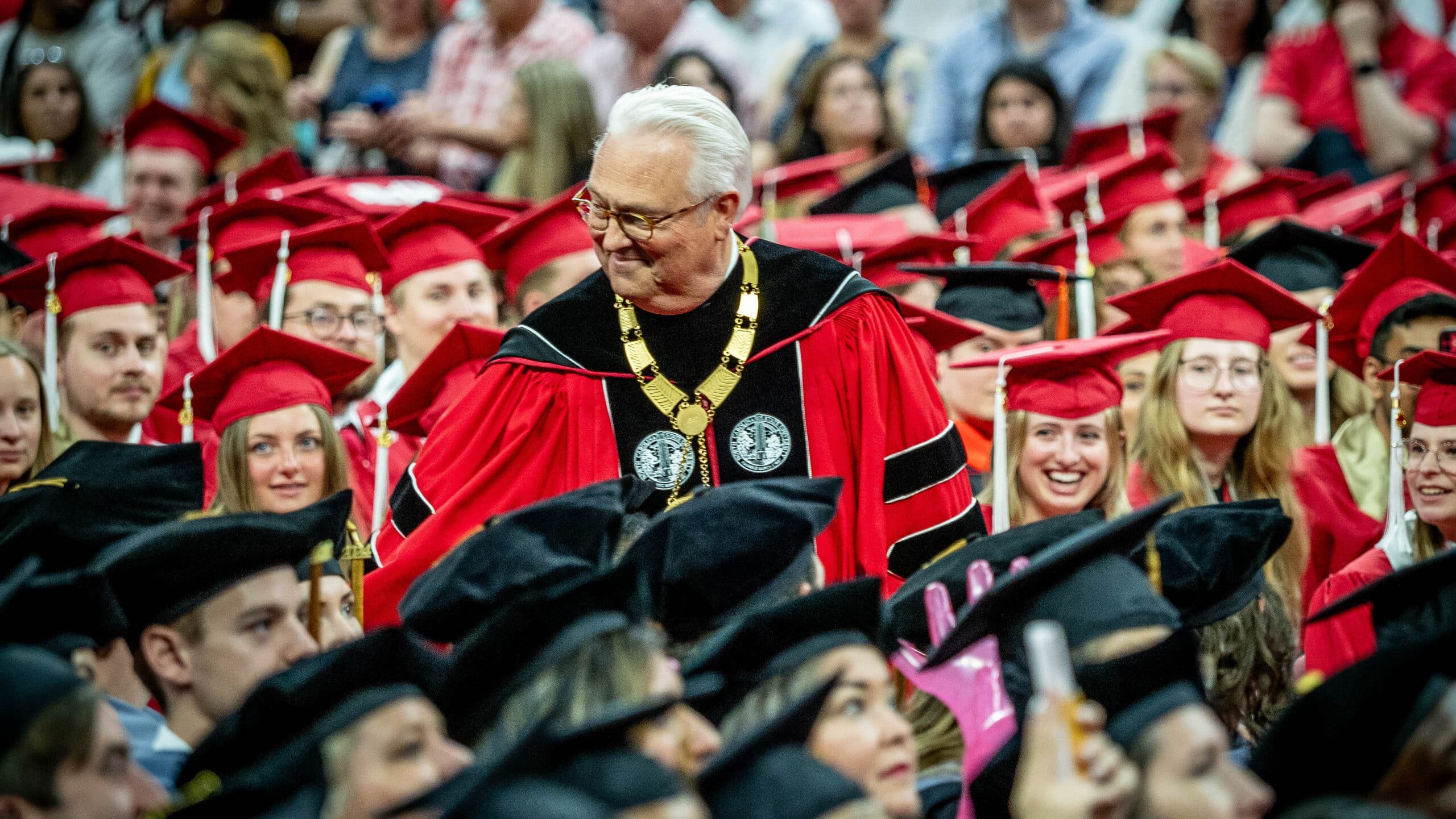 Chancellor Woodson with Students at Graduation