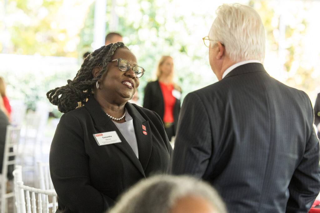 Chancellor Woodson speaks with alumni