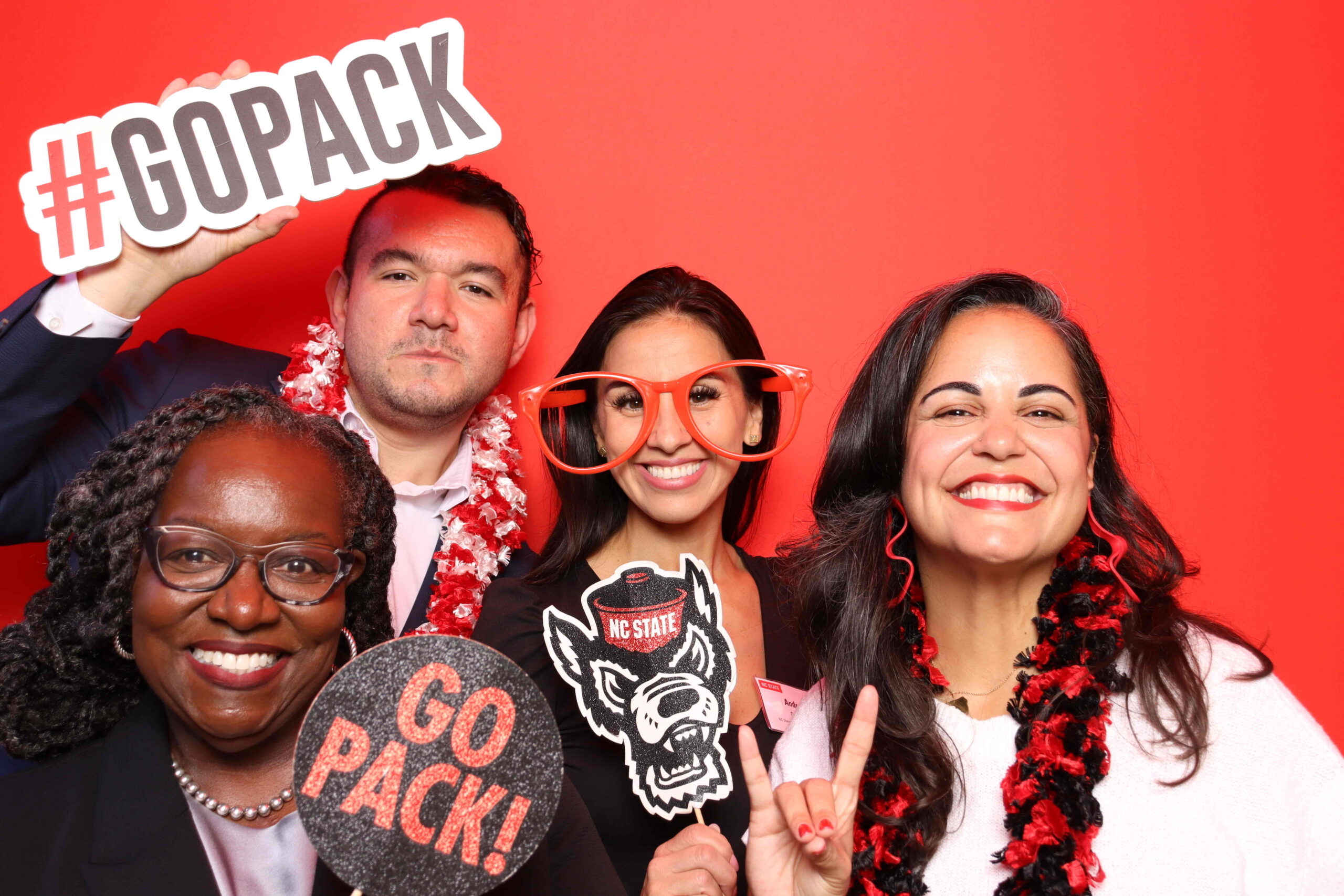 Alumni celebrate Red and White Week with the photo booth.