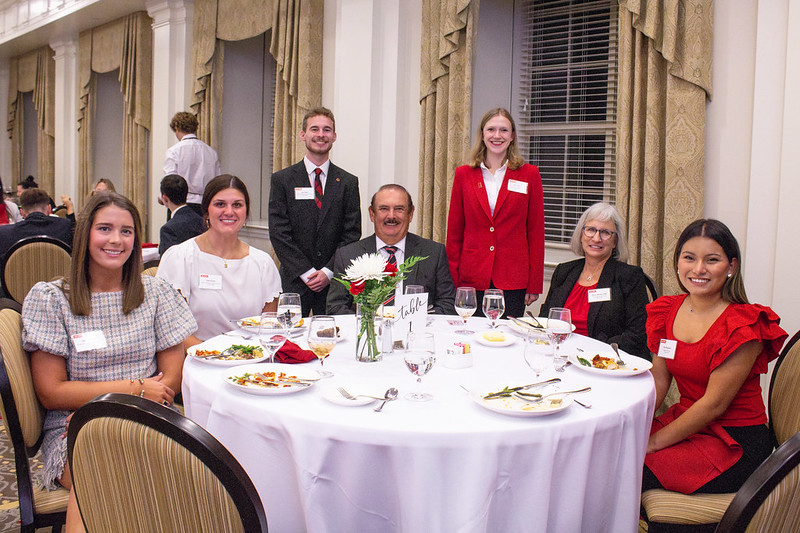 (left to right) Meredith Eure '25, Ashlin Austin '25, Josh Sutton '25, Walter Smith '76, Ritter Dodson '25, Sharon Monday '87 '90 '94, Kira Hageness '25