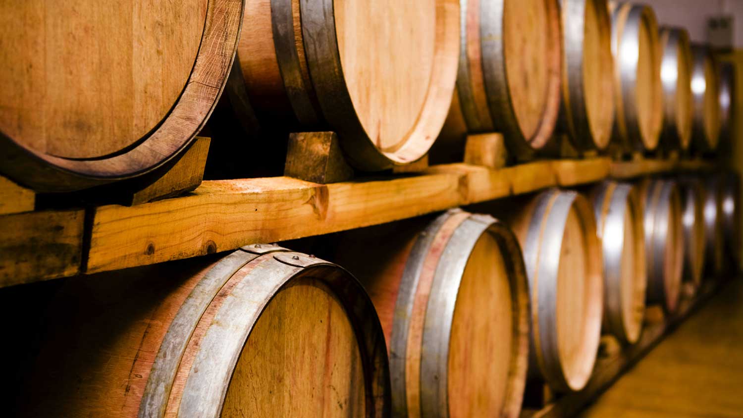 A collection of wooden wine barrels.